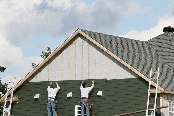 Professional Siding Installation technician working in Redmond, OR